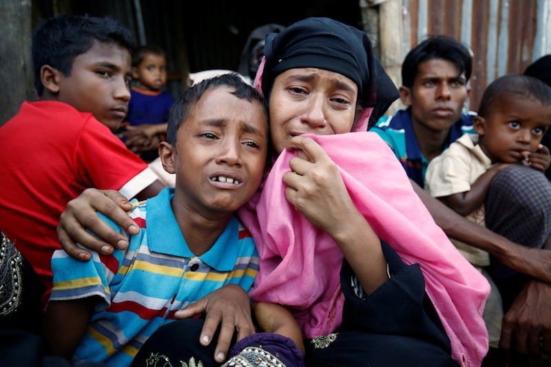 A Rohingya Muslim woman and her son cry after being caught by Border Guard Bangladesh (BGB) while illegally crossing at a border check point in Coxu00e2u20acu2122s Bazar , Bangladesh, November 21, 2016. u00e2u20acu201d Reuters pic