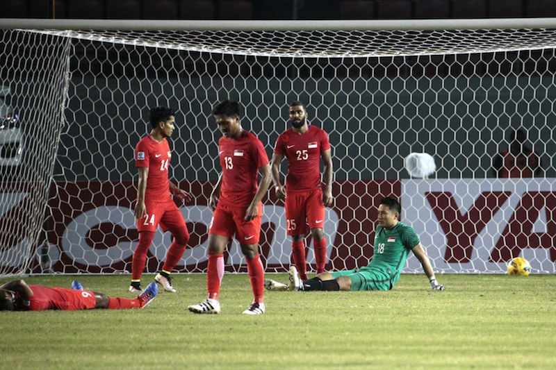 Singapore football team despondent after losing to Thailand 1-0, thanks to a late goal. u00e2u20acu201d TODAY pic