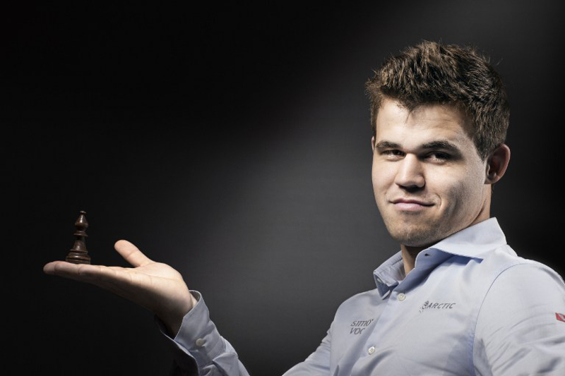 This file photo taken on June 8, 2016 shows Norwegian world chess champion Magnus Carlsen posing with his favourite chess piece (a bishop) in Paris. u00e2u20acu201d AFP pic