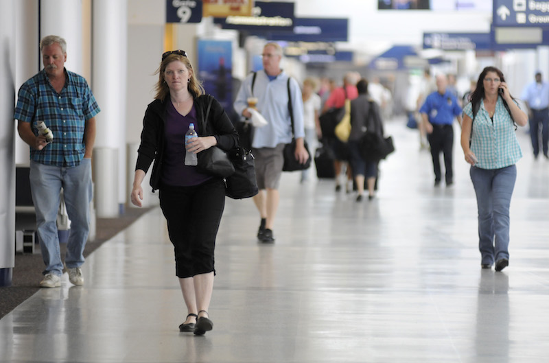Travellers at the Buffalo-Niagara International Airport in Cheektowaga, New York, July 10, 2013. u00e2u20acu201d NYT pic 