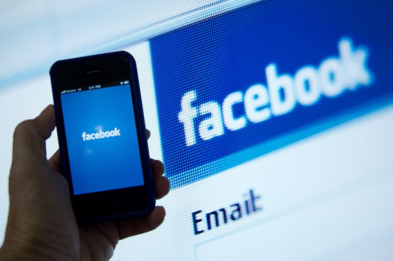 A view of and Apple iPhone displaying the Facebook app's splash screen on May 10, 2012. u00e2u20acu201d AFP pic