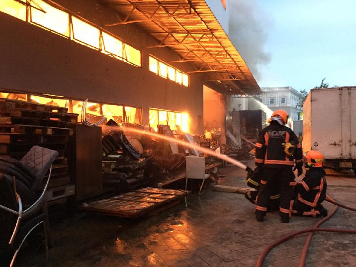 Firefighters putting out the fire that gutted a Sungei Kadut warehouse. u00e2u20acu201d Picture courtesy of The Singapore Civil Defence Force