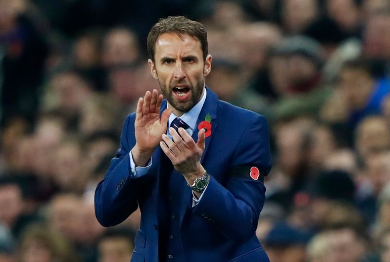 England interim manager Gareth Southgate during the World Cup qualifier against Scotland at Wembley November 11, 2016. He has the red poppy motif on his jacket lapel and black armband. u00e2u20acu201d Reuters pic
