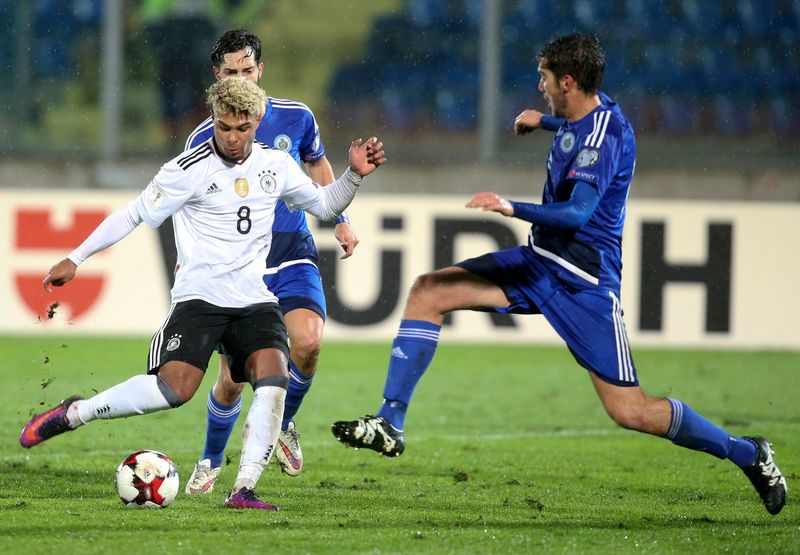 Germany's Serge Gnabry (left) and San Marino's Luca Tosi in World Cup qualifying action in San Marino November 11, 2016. u00e2u20acu201d Reuters pic