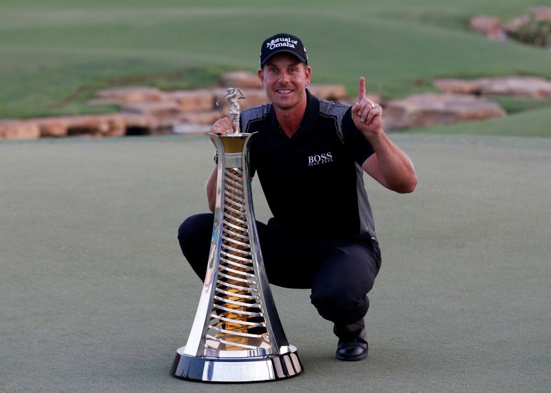 Golf - DP World Tour championship- Dubai, UAE - 20/11/16 - Henrik Stenson of Sweden poses with the trophy after he won the Race to Dubai. REUTERS/Ahmed Jadallah