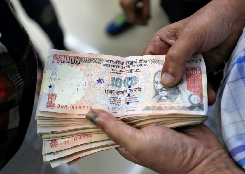 A customer waits to deposit 1000 Indian rupee banknotes in a cash deposit machine at bank in Mumbai November 8, 2016. u00e2u20acu2022 Reuters pic