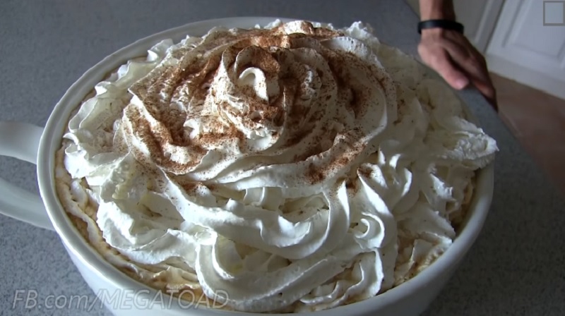 This massive cup of pumpkin spice latte is made up of seven Venti-sized pumpkin spice lattes from Starbucks. u00e2u20acu201d Picture via YouTube/Matt Stonie