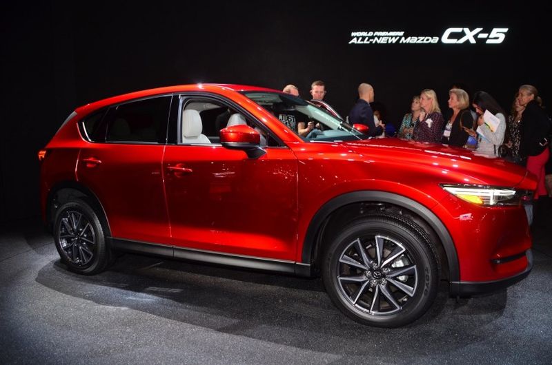 The Mazda CX-5 u00e2u20acu2022 a car that comes with a head-up display as standard, a remote tailgate and the option of a unique shade of exterior red paint. u00e2u20acu2022 AFP pic
