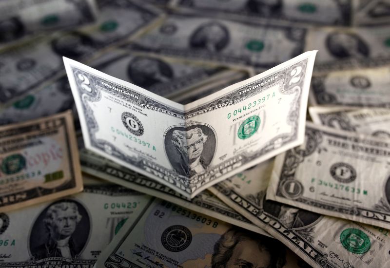 US dollar notes are seen in this November 7, 2016, picture illustration. REUTERS/Dado Ruvic/Illustration
