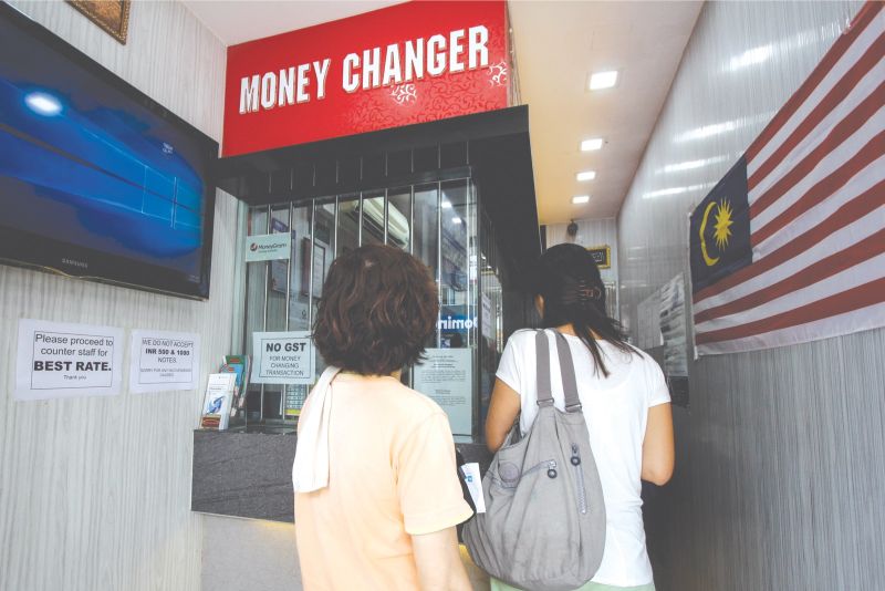 Money changers like this one have not been trading in Rs500 and Rs1000 notes since Wednesday. u00e2u20acu201d Picture by Hari Anggara