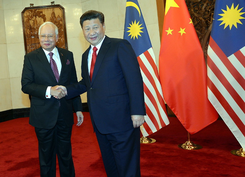 Prime Minister Datuk Seri Najib Razak shakes hand with China President Xi Jingping at Diaoyutai State Guest House in Beijing, November 3, 2016. u00e2u20acu201d Bernama pic