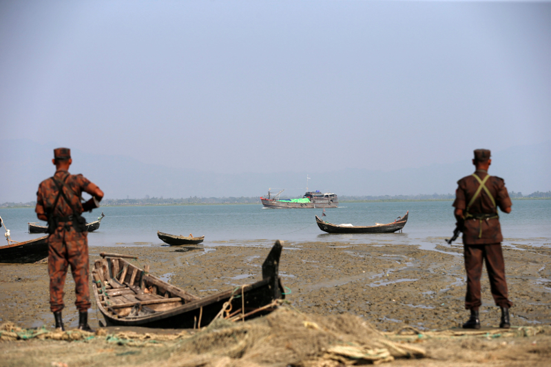 Members of Border Guard Bangladesh (BGB) stand guard on the bank of Naf River near the Bangladesh-Myanmar border to prevent Rohingya refugees from illegal border crossing, in Teknaf near Coxu00e2u20acu2122s Bazaar November 22, 2016. u00e2u20acu201d Reuters pic