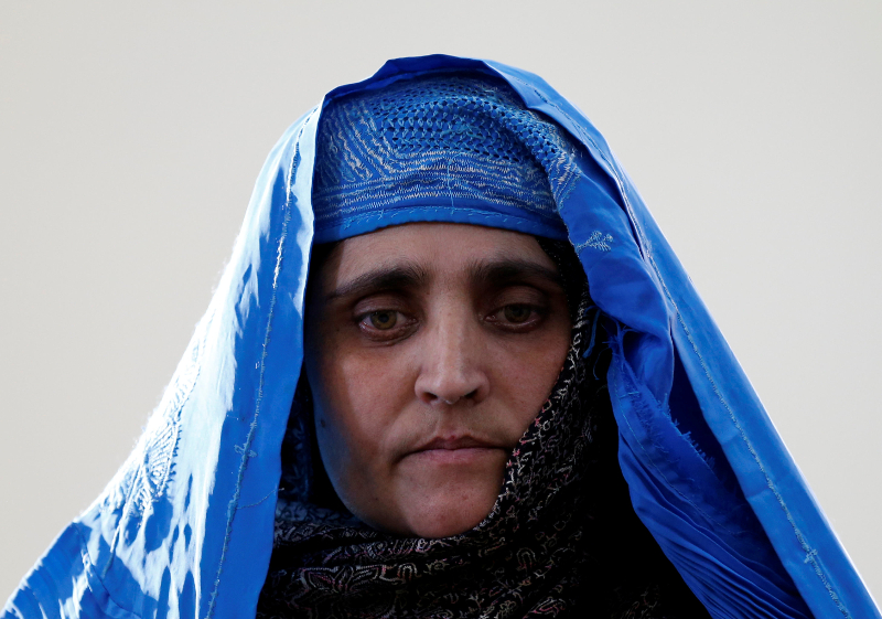 Sharbat Gula, the green-eyed u00e2u20acu02dcAfghan Girlu00e2u20acu2122 whose 1985 photo in National Geographic became a symbol of her country's wars, arrives to meet with Afghanistan's President Ashraf Ghani in Kabul November 9, 2016. u00e2u20acu201d Reuters pic