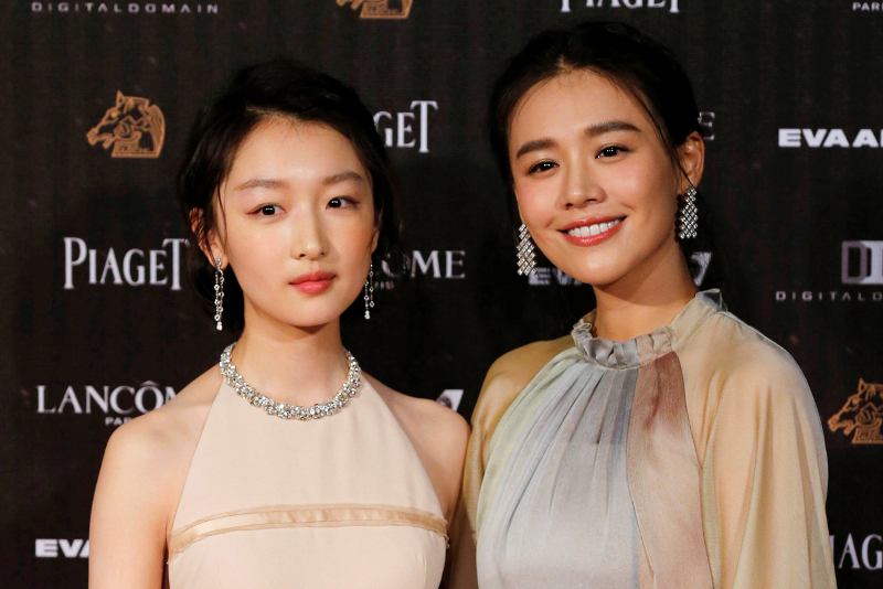Actors Zhou Dongyu (left) and Ma Sichun pose on the red carpet at the 53rd Golden Horse Awards in Taipei November 26, 2016.