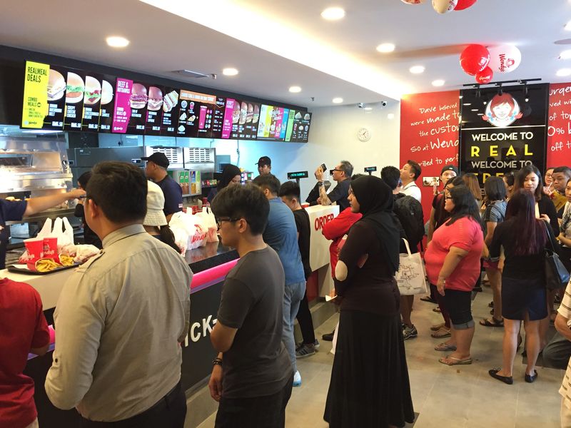Customers queuing to order at the new Wendy's outlet in Penang, November 4, 2016.