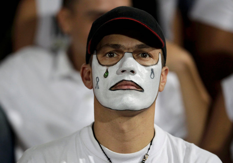 A fan of Atletico Nacional wears face paint while paying tribute to the players of Brazilian club Chapecoense killed in the recent airplane crash, in Medellin November 30, 2016. u00e2u20acu201d Reuters pic