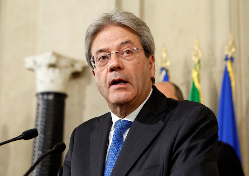 Paolo Gentiloni talks to reporters after receiving a mandate to try to form the countryu00e2u20acu2122s new government, at the Quirinal Palace in Rome December 11, 2016. u00e2u20acu201d Reuters pic