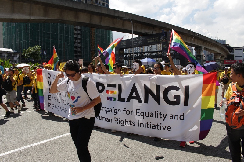 LGBT rights supporters join Bersih 5 rally holding a banner by the Pelangi Campaign for Equality and Human Rights Initiative in Kuala Lumpur November 19, 2016. u00e2u20acu201d Picture courtesy of Joshua Tan
