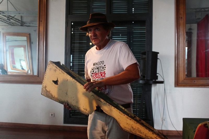 Blaine Gibson, an American lawyer turned self-funded sleuth, carries a debris suspected to be from the Malaysia Airlines Flight MH370 in Antananarivo, Madagascar December 5, 2016. — Reuters pic