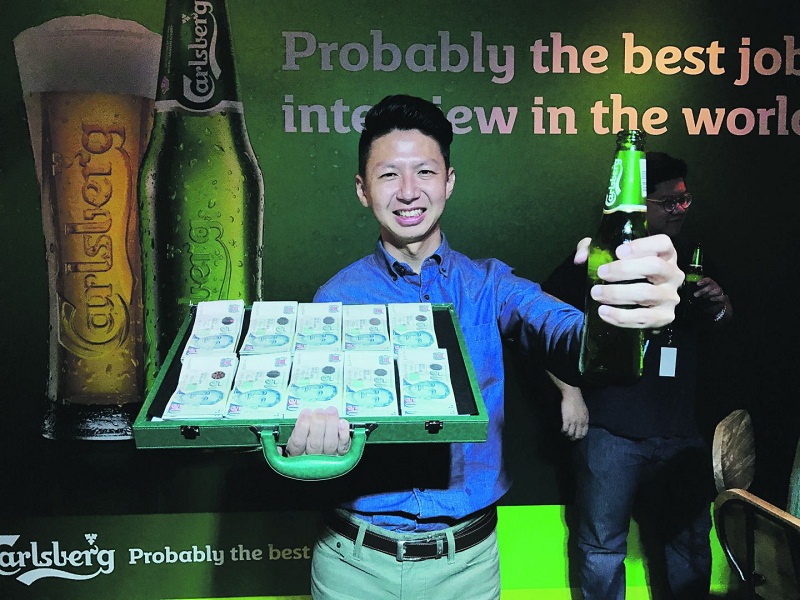 Royston Lim Qi Lun is the winner for this yearu00e2u20acu2122s Carlsberg probably the best job in the world campaign. u00e2u20acu201d TODAY pic