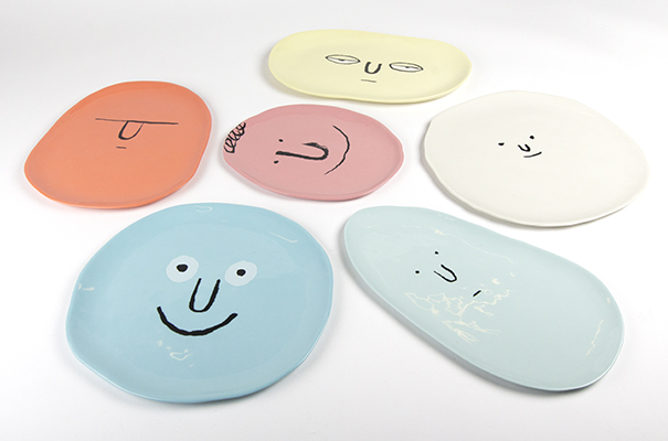 The collection features six different plates, to which Jean Jullien has added faces.