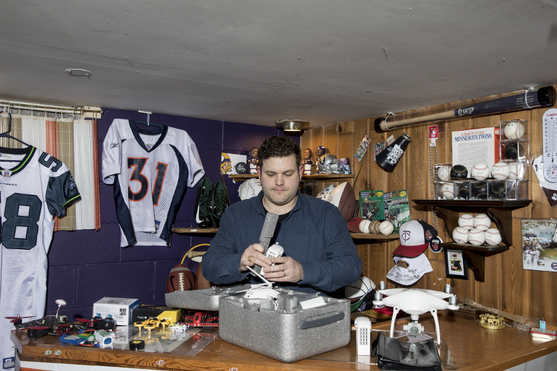 Kyle Christy packs his DJI Phantom 4 drone and their batteries at his home, in North Saint Paul, Minnesota December 23, 2016. u00e2u20acu201d Picture by Tim Gruber/The New York Times