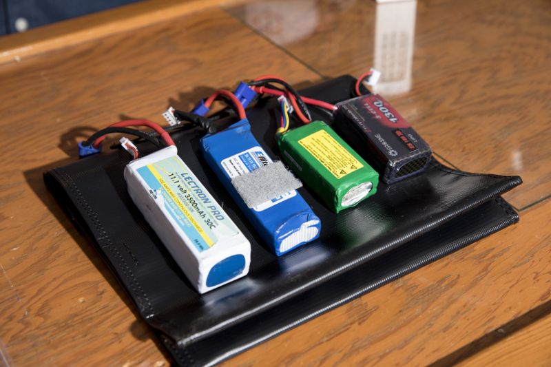 Batteries for drones that Kyle Christy owns sit on a fireproof bag at his home, in North Saint Paul, Minnesota December 23, 2016.