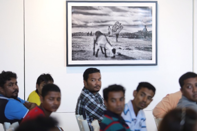 People attend the opening of ‘No. 136: A Rohingya Photography Exhibition’ in Kuala Lumpur December 16, 2016. — Picture by Choo Choy May