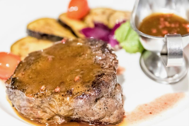 At Line Brew, horse steak is served with a demi-glace sauce with whole pink peppercorns. 