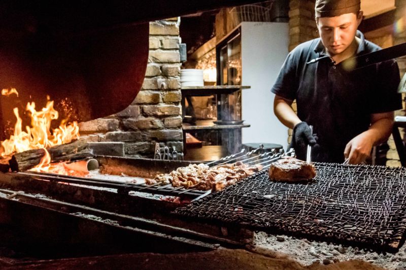 Steak and skewers are cooked at Line Brew. 