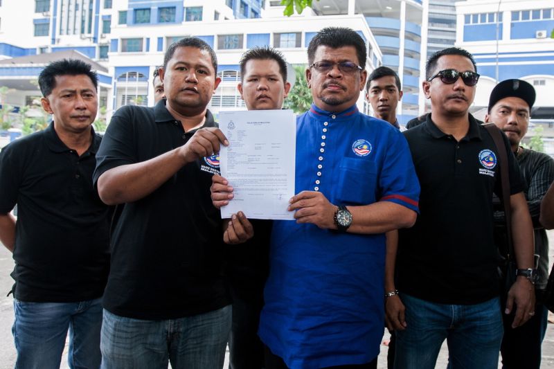 Presiden Pertubuhan Nadi Rakyat Malaysia Mohamad Rafi Awang Kechik selepas membuat laporan polis terhadap Zahid Mat Arip di Ibu Pejabat Polis Daerah Dang Wangi 14 Disember 2016. u00e2u20acu2022 Foto Bernama
