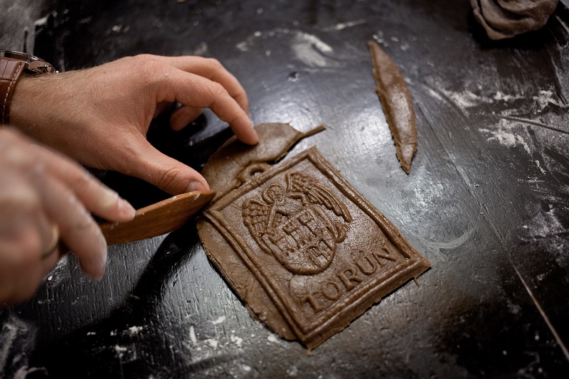 A cookie is prepared during a workshop on traditional baking techniques at the Living Museum of Gingerbread in Torun, Poland, November 26, 2016. u00e2u20acu201d Picture by Piotr Malecki/The New York Times 