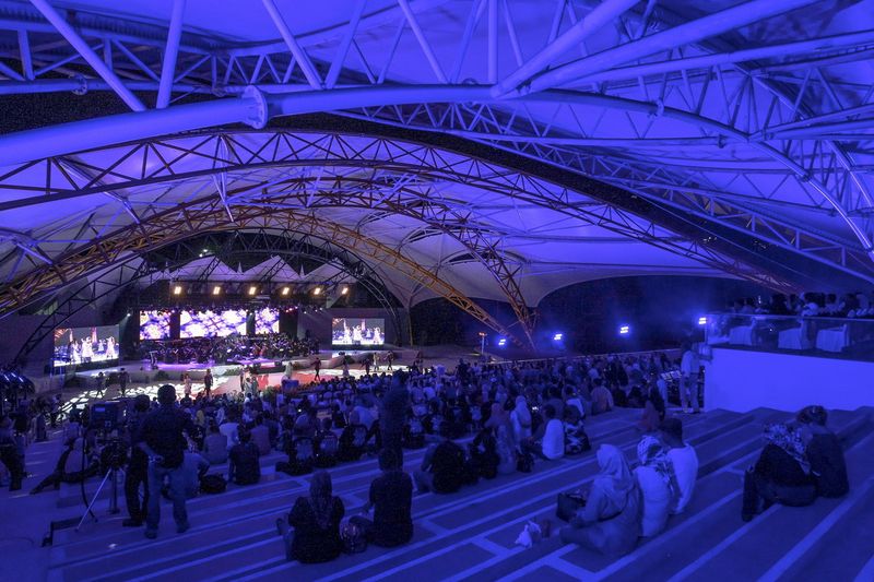 People attending a concert in held in conjunction with the reopening of Panggung Anniversary in Taman Botani Perdana, Kuala Lumpur last night. u00e2u20acu201d Bernama pic