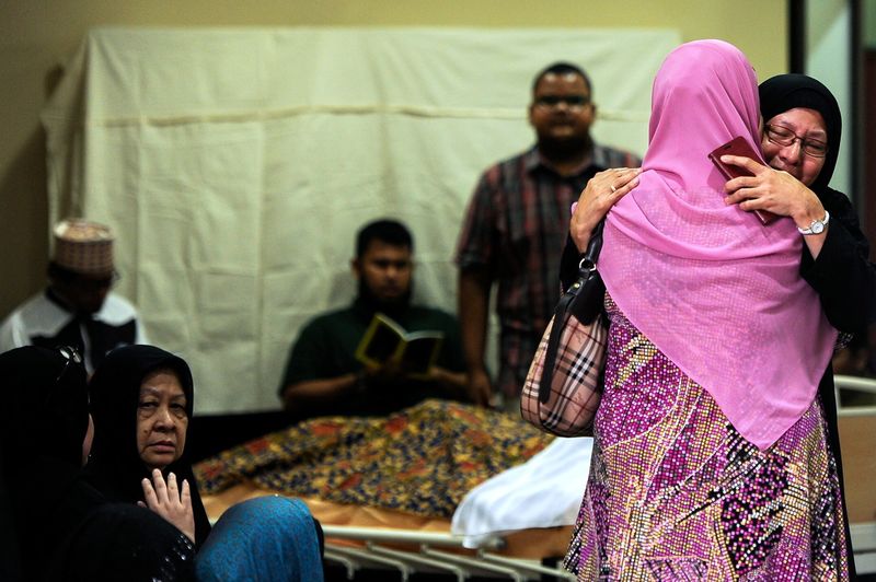 An atmosphere of sadness envelopes the residence of Tan Sri SM Salim, in Ukay Perdana. The legendary singer passed away at 5.44pm December 29, 2016. His wife, Puan Sri Aishah Ghani is seen seated left. u00e2u20acu201d Bernama pic