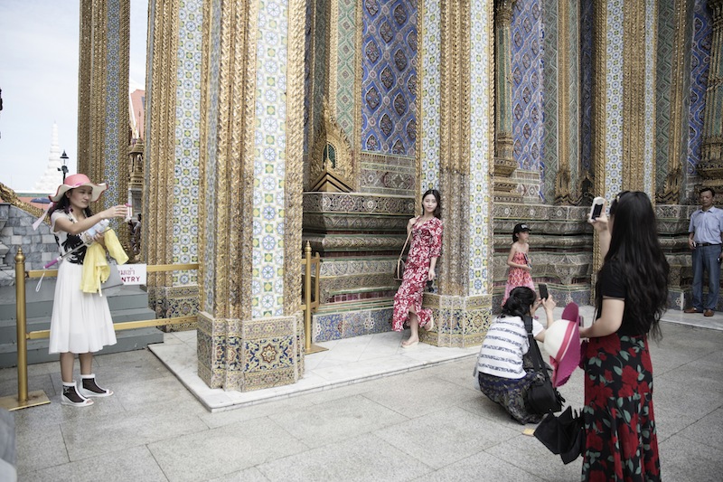 Chinese tourists at the Grand Palace in Bangkok, Thailand, November 25, 2015. u00e2u20acu201d NYT pic 