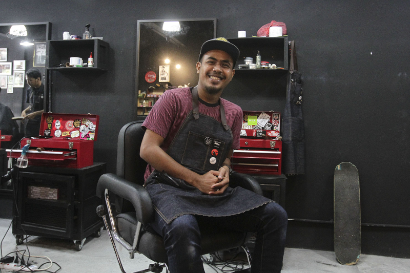 Slick co-founder Shazwan started up the business with only three barber chairs. — Picture by Yusof Mat Isa