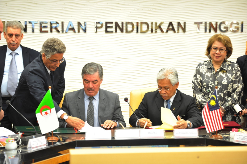 Malaysian Higher Education Minister Datuk Seri Idris Jusoh and Algerian Minister of Higher Education and Scientific Research Prof Dr Tahar Hadjar signed the MoU in Putrajaya December 5, 2016. u00e2u20acu201d Bernama pic