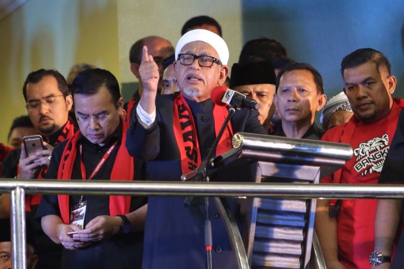 PAS president Datuk Seri Abdul Hadi Awang giving a speech at the 'Solidarity for Rohingya' gathering outside the Titiwangsa Stadium, December 4, 2016. u00e2u20acu201d Picture by Choo Choy May