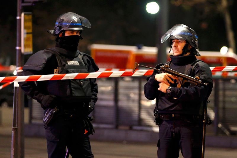 Armed French police secure a street near the travel agency where a gunman has taken hostage about half a dozen people in what appears to be a robbery, a police source said, in Paris December 2, 2016. u00e2u20acu201d Reuters pic