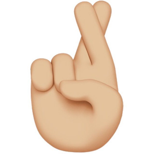 Hand with index and middle fingers crossed. — Courtesy of Apple