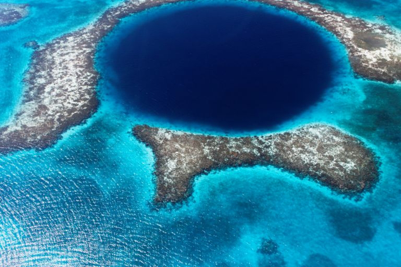 The Great Blue Hole in Belize is a diving hotspot. — Picture by Lomingen/Istock.com via AFP