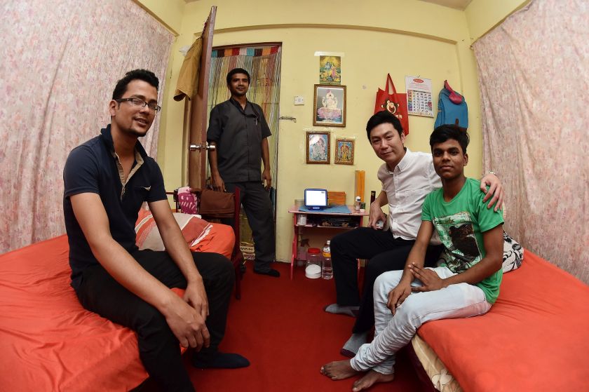 Piyush Sunwar, Kul Bahadur Karki, KH Lee and Rakesh Sani in the flat Rakesh shares with five other Nepalese workers.