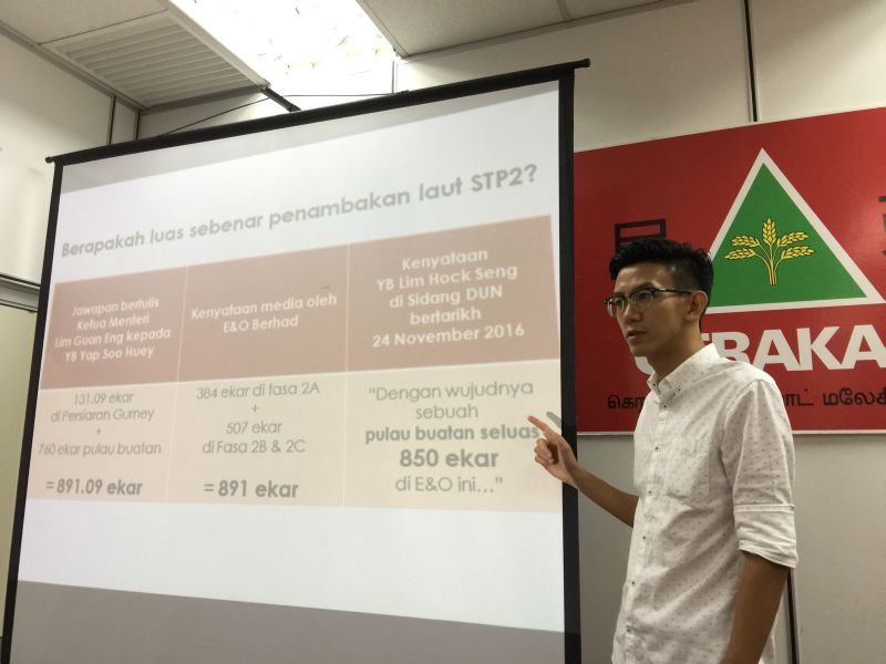 Penang Gerakan representative Ooi Zhi Yi questions the actual size of the planned reclamation project off Gurney Drive. u00e2u20acu2022 Picture by Opalyn Mok