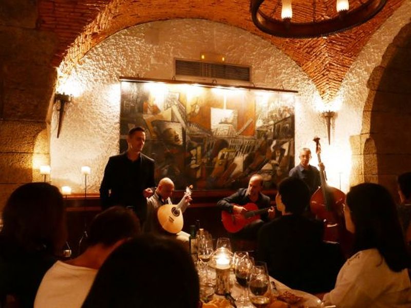 Eat and listen to Fado in Lisbon. This traditional Portugese folk music usually includes simple instruments such as guitars and mandolins and one Fadista singing melancholic tines of love, death and sadness.