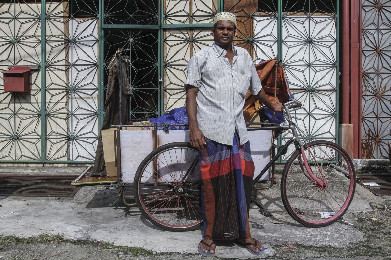 Abdul Rahman and his trishaw.