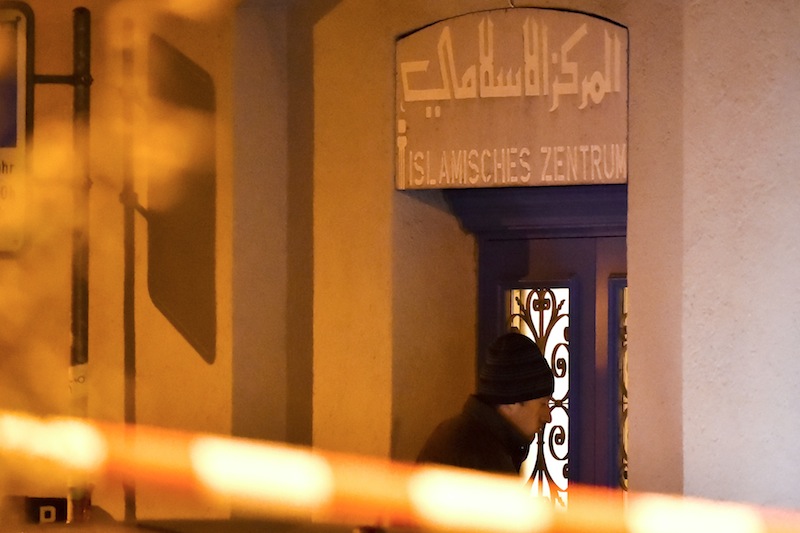 A  Swiss policeman enters the Islamic Center in central Zurich, on December 19, 2016, after three people were injured by gunfire in the Muslim prayer hall. u00e2u20acu201d AFP pic