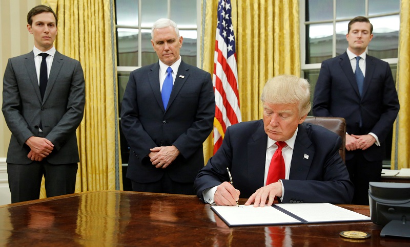 US President Donald Trump signs his first executive orders at the White House in Washington January 20, 2017. u00e2u20acu201d Reuters pic
