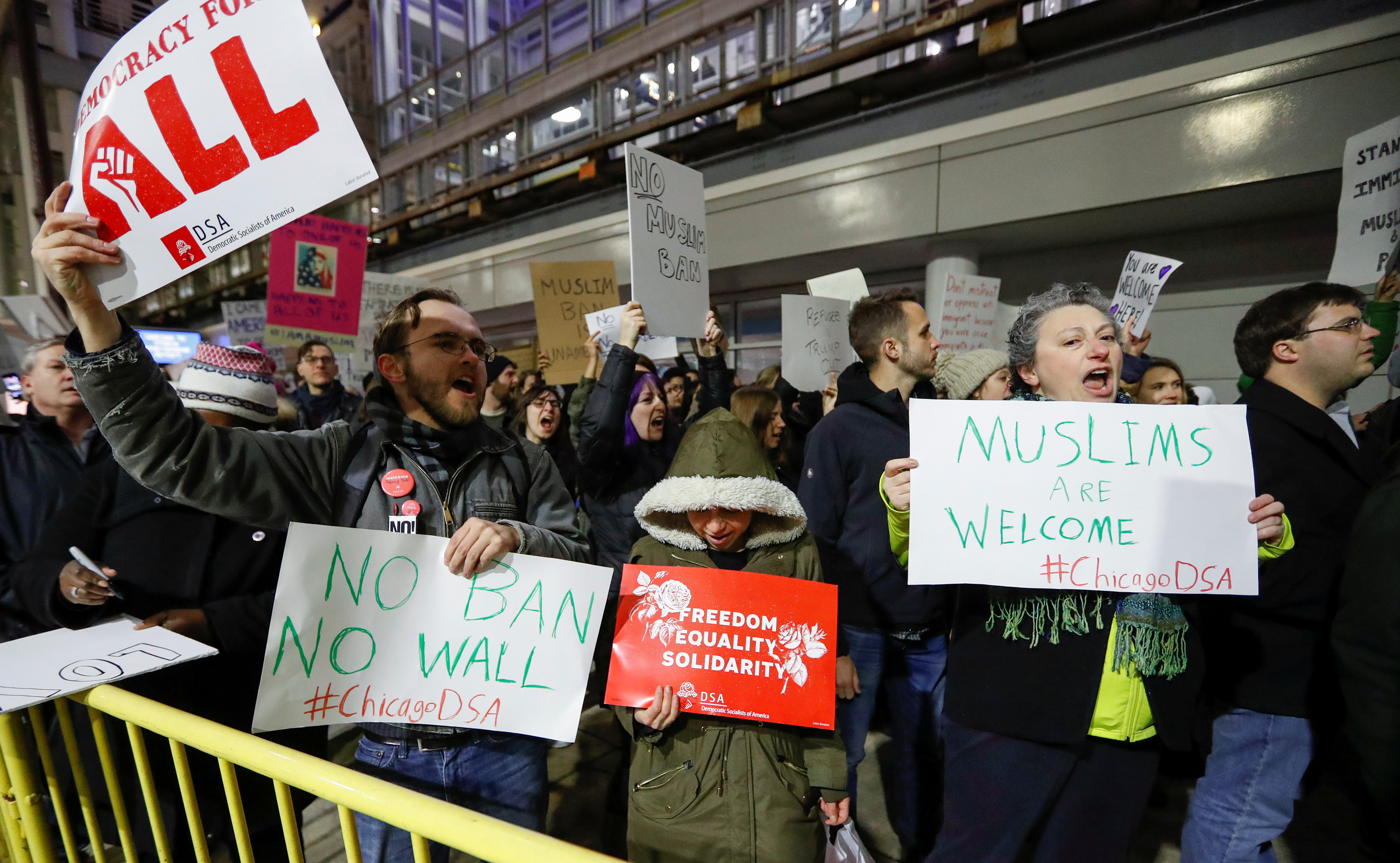 People gather to protest against the travel ban imposed by U.S. President Donald Trump's executive order, at O'Hare airport in Chicago, Illinois, U.S. January 28, 2017. REUTERS/Kamil Krzaczynskin