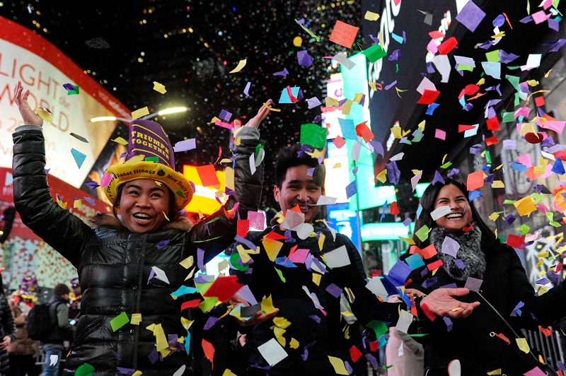 People play in confetti in Times Square during New Year celebrations in New York  January 1, 2017. u00e2u20acu201d Reuters pic