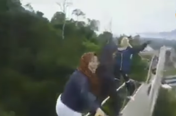 Video showing a group of people climbing the 20-metre high u00e2u20acu02dcIPOHu00e2u20acu2122 signboard went viral on social media for the past several days. u00e2u20acu201d Screen capture from YouTube/Malaysia Viral Video